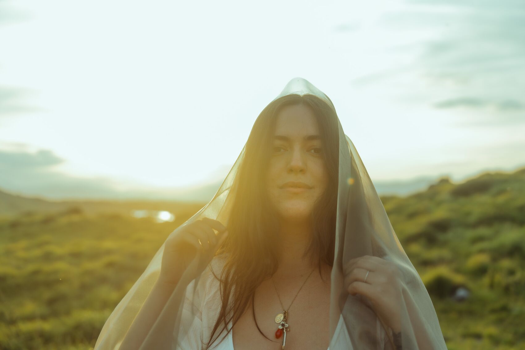 Natalie Bozarth veiled in the light of a setting sun