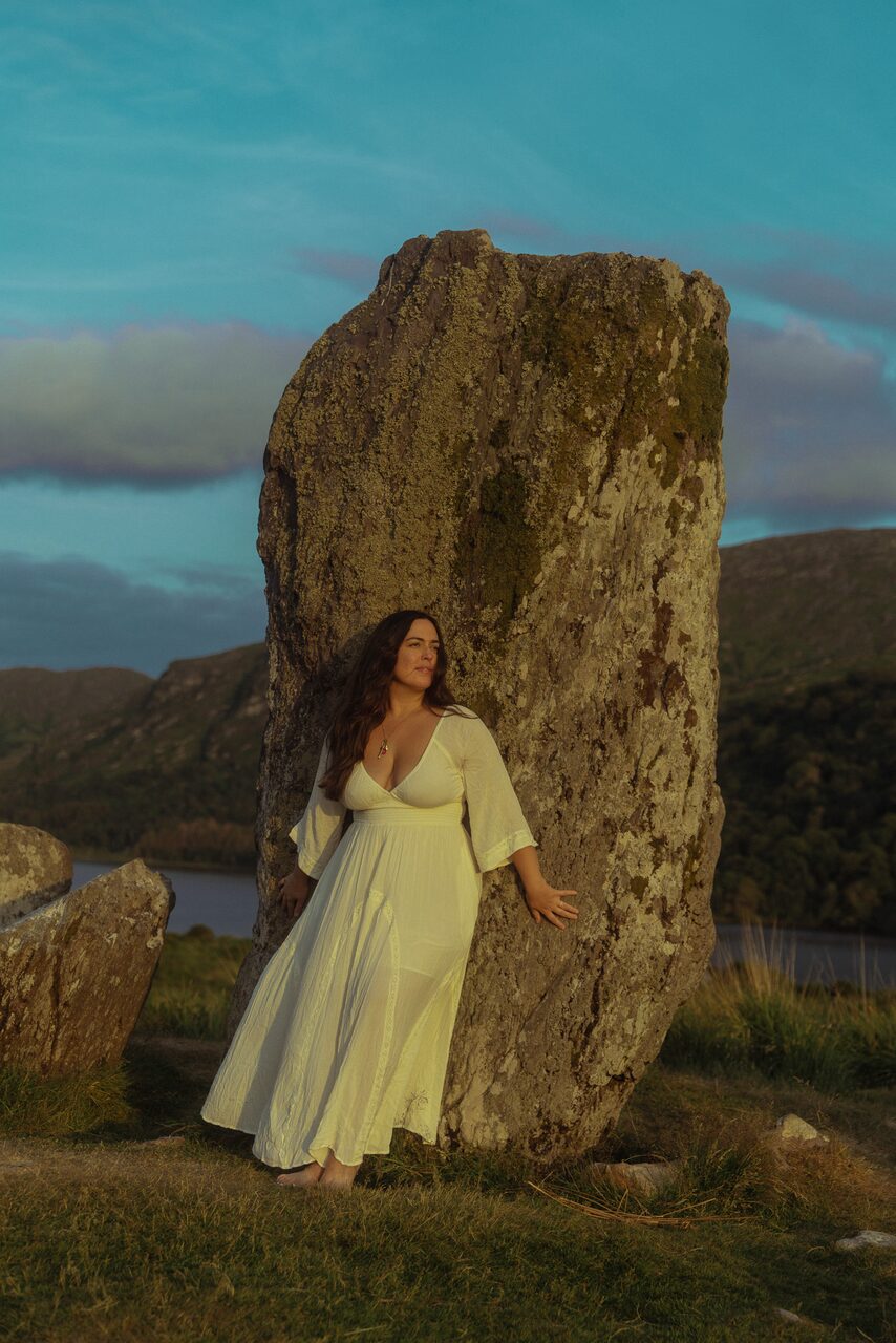 Natalie Bozarth at the standing stone, golden hour